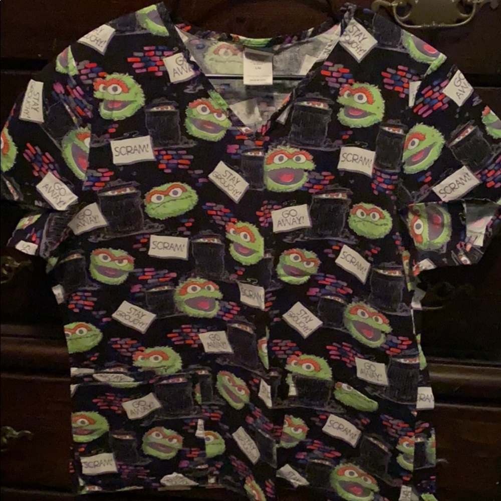 Lot of 7 LG scrub shirts